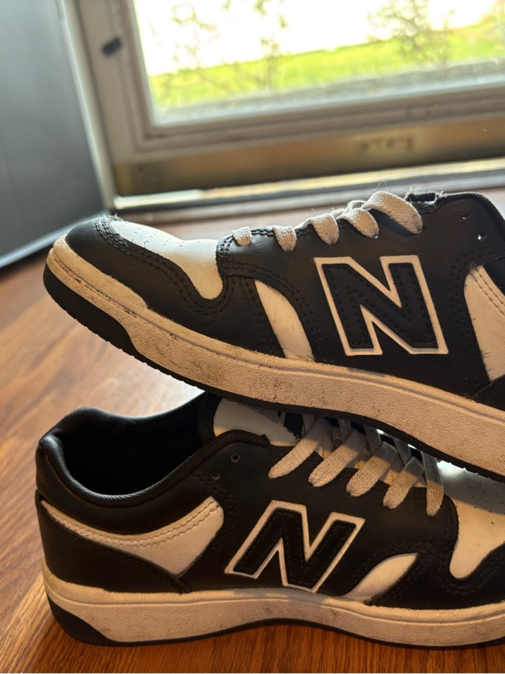 New Balance Kids Black and White Low-Top Sneakers